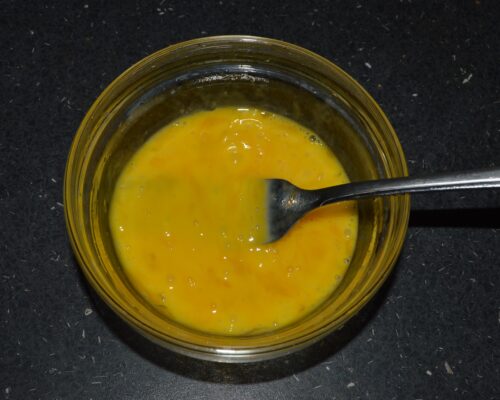 Beat the eggs with a fork.