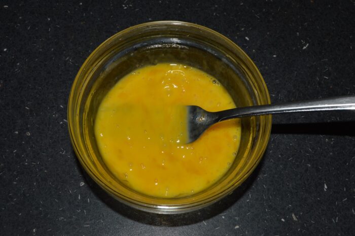 Beat the eggs with a fork.