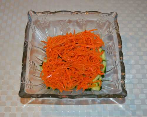 Add the koreean carrot salad.