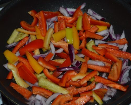 add the peppers and onions