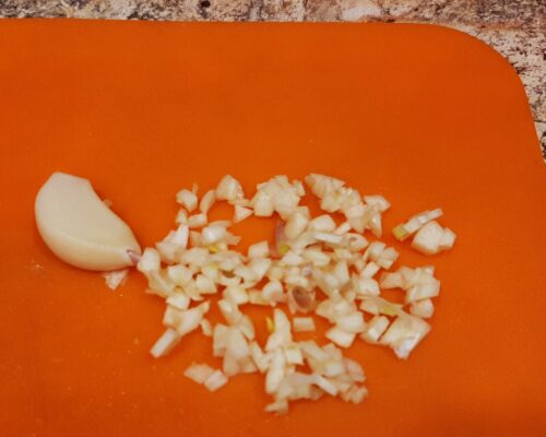 Peel the garlic and chop