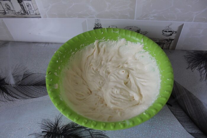 Mix the butter at room temperature with the condensed milk