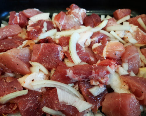 Place a layer of meat and onions