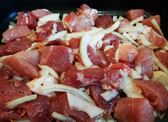 Place a layer of meat and onions