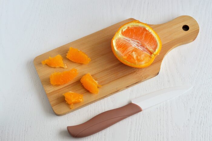 Peel the orange and cut