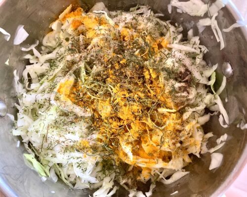 mix the squeezed cabbage with salt