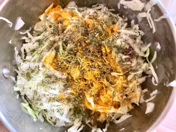 mix the squeezed cabbage with salt