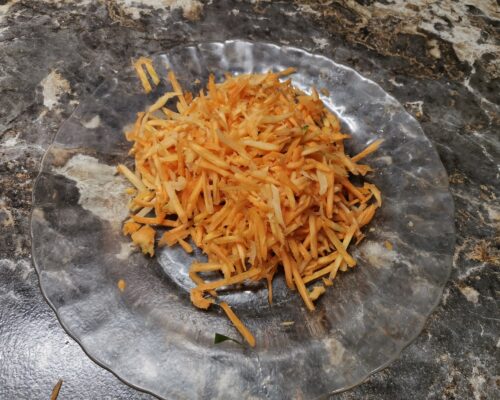 Grate the carrots