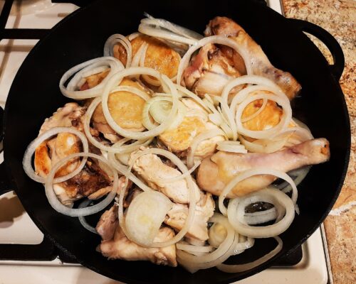 Add the onion rings to the meat