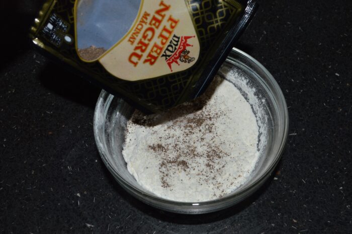 Sprinkle with ground black pepper