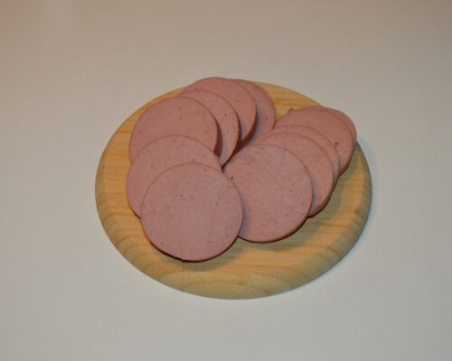First, slice the salami