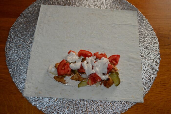 Top the filling with a spoonful of sauce