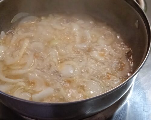 Put the onions in the cauldron
