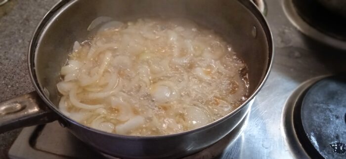 Put the onions in the cauldron