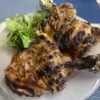 Grilled chicken thighs marinated in garlic, honey, mustard and spices