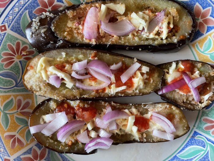 Sprinkle with onion and garlic cloves