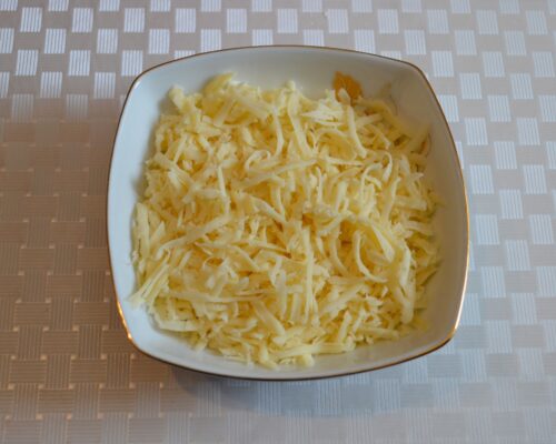 Grate the cheese using a coarse grater