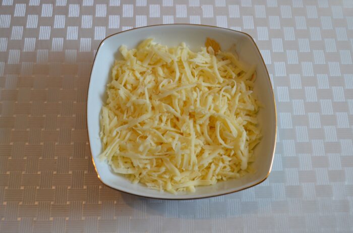 Grate the cheese using a coarse grater