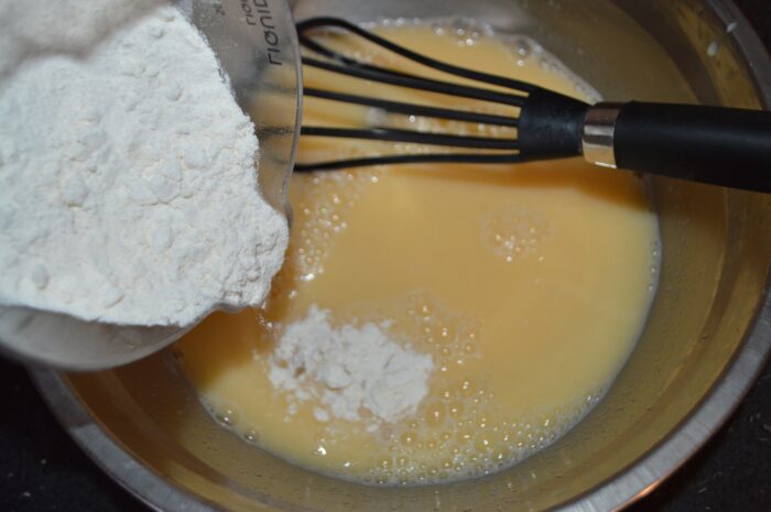 Add flour gradually