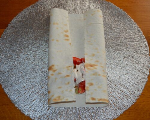 Tuck in the edges of the lavash