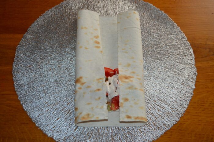 Tuck in the edges of the lavash