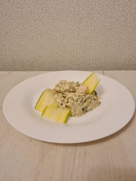 Creamy shrimp risotto topped with mozzarella and dill