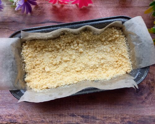 Spread about two-thirds of the crumbly dough