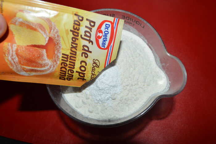 Mix baking powder with flour