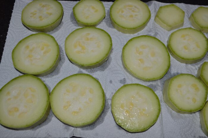 place them on a paper towel to absorb the water