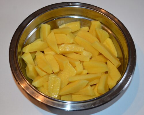peel and roughly chop the potatoes