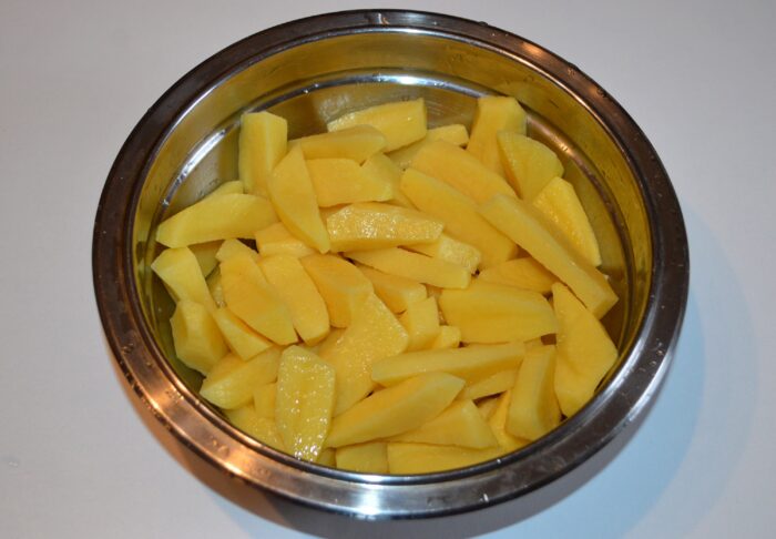 peel and roughly chop the potatoes