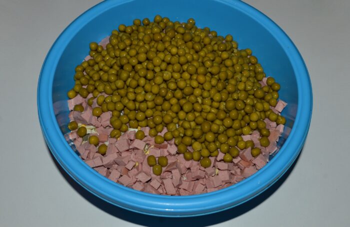 add the peas to the salad