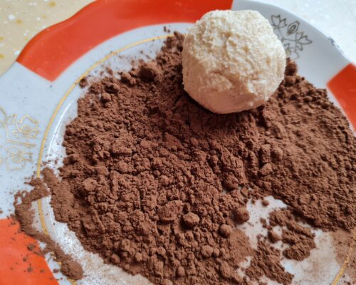 roll each cookie in the cocoa mixture