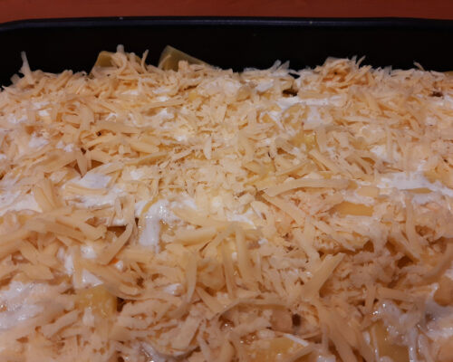 Grate the cheese on a coarse grater