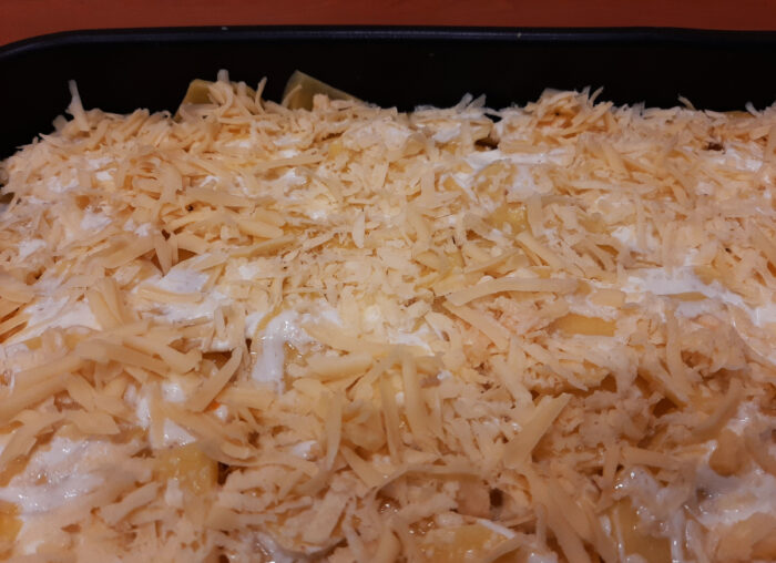 Grate the cheese on a coarse grater