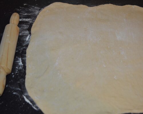 spread it on the table with a rolling pin