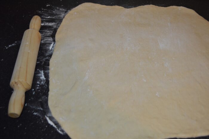 spread it on the table with a rolling pin