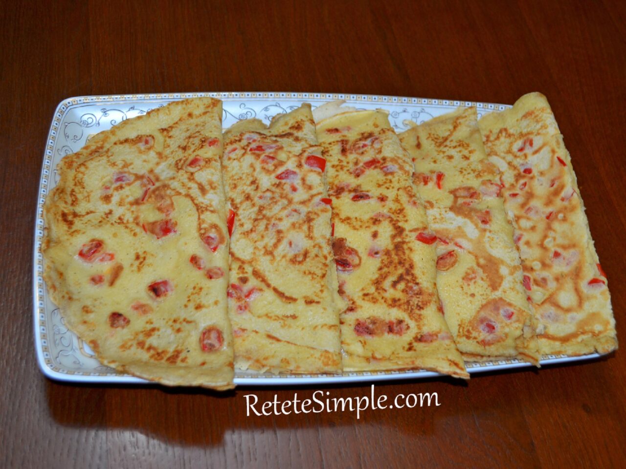 Appetizer pancakes with pepper and cheese