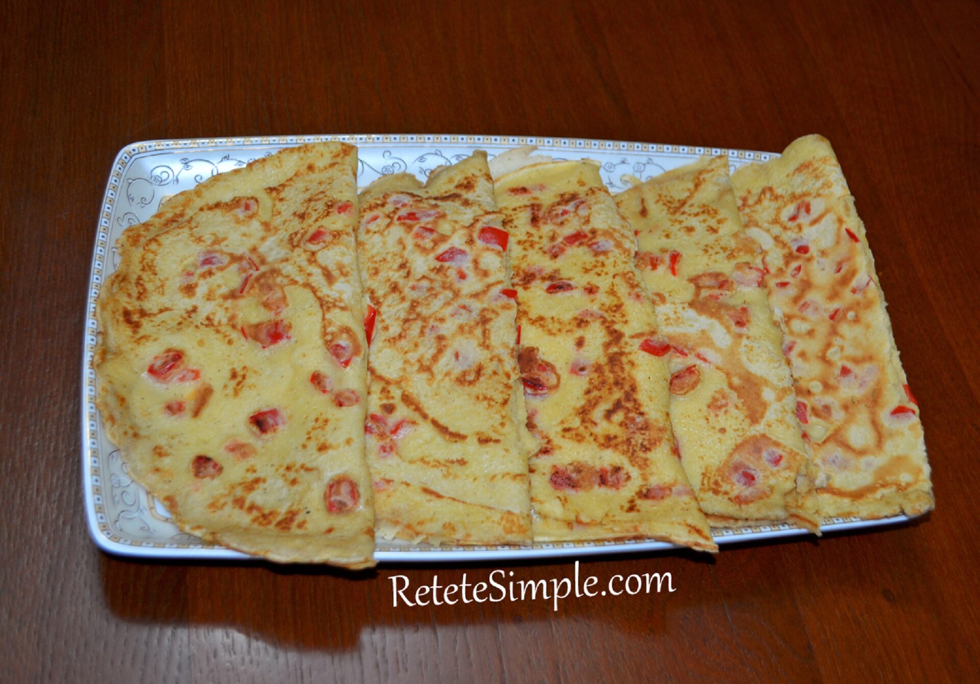 Appetizer pancakes with pepper and cheese
