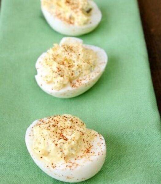 Close‑up of deviled eggs with creamy mustard‑mayo filling