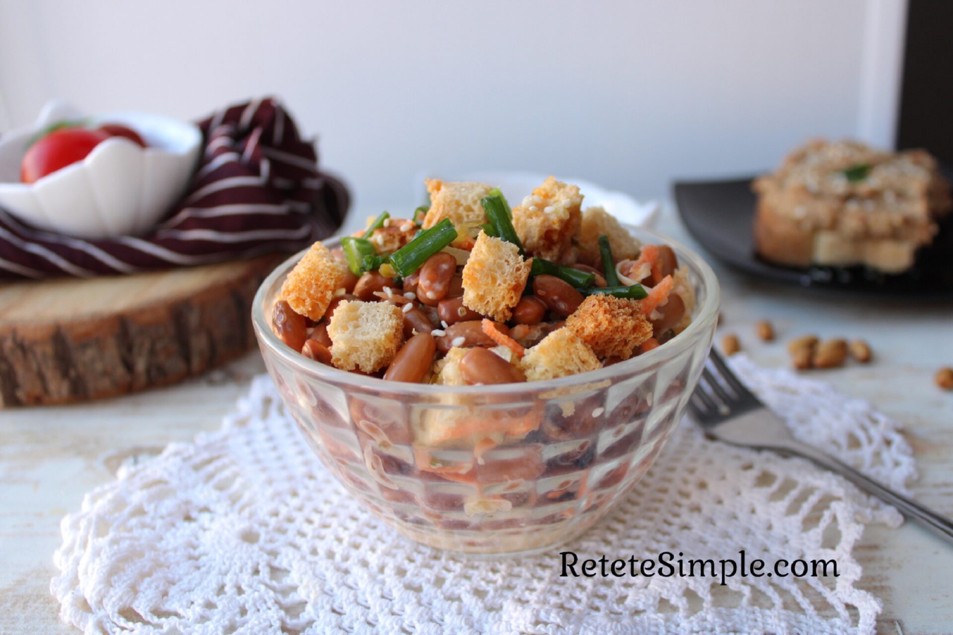 Bean, cheese & croutons salad with pickled cucumber and carrot