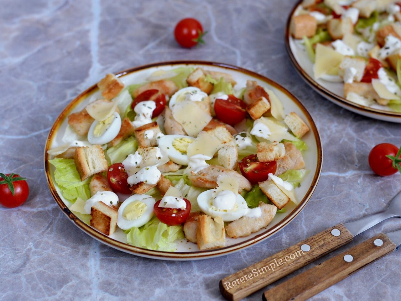 Caesar salad with chicken, quail eggs & cherry tomatoes