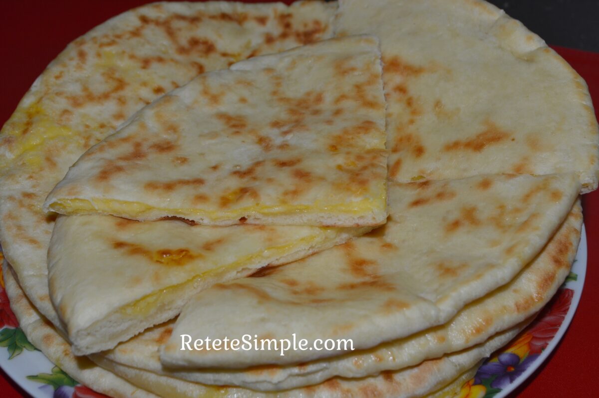 Cross-section showing melty cheese inside turnover