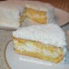 Slice of coconut cake showing creamy layers image