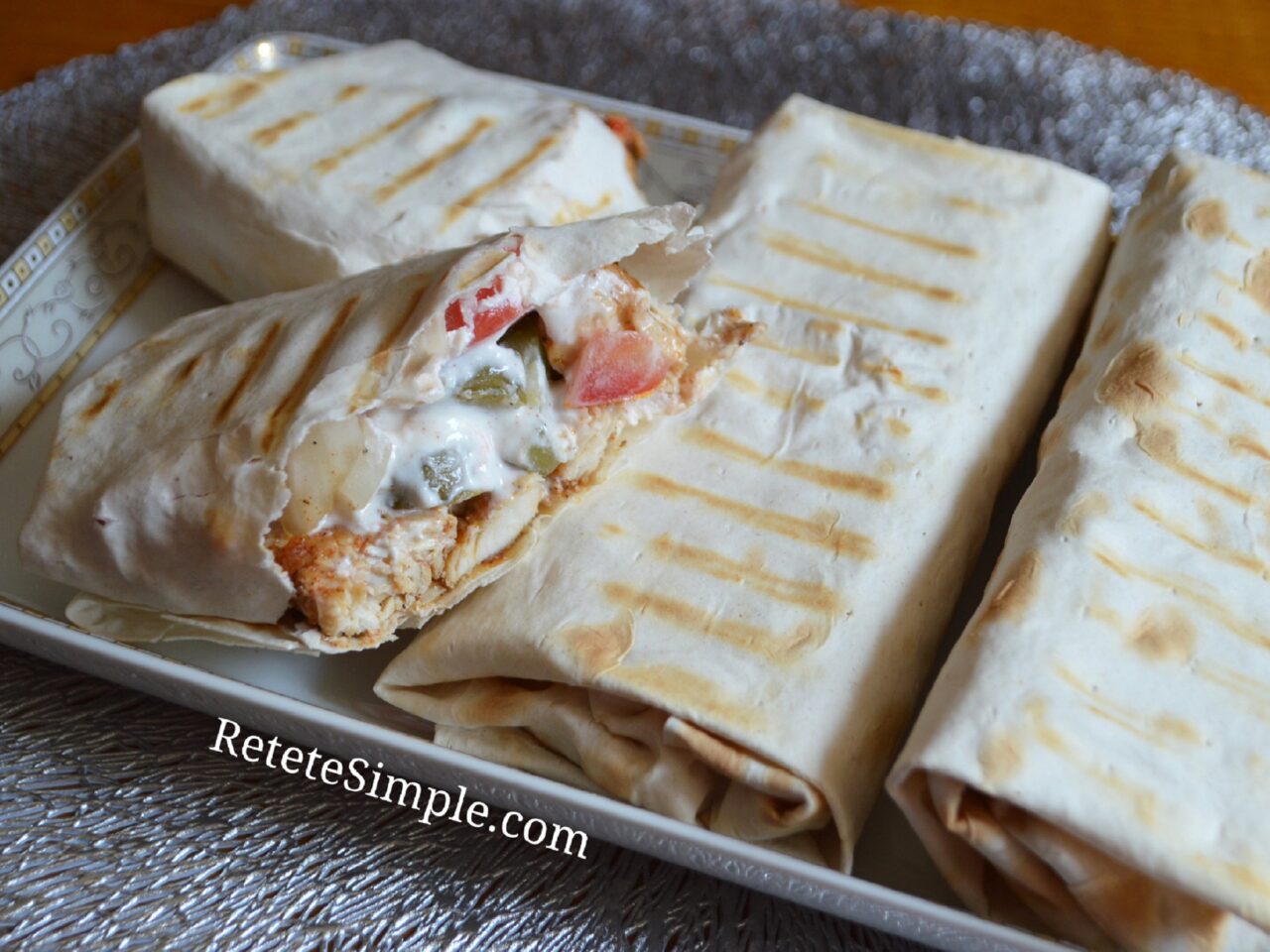 Healthy chicken shawarma wrap with yogurt sauce and fresh veggies