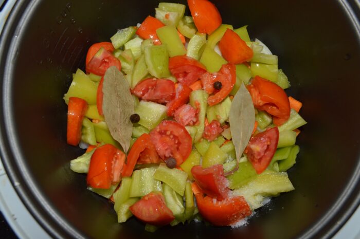 Add the black peppercorns and bay leaves