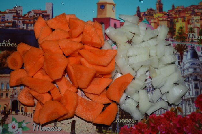 Chop one of the onions and the carrot