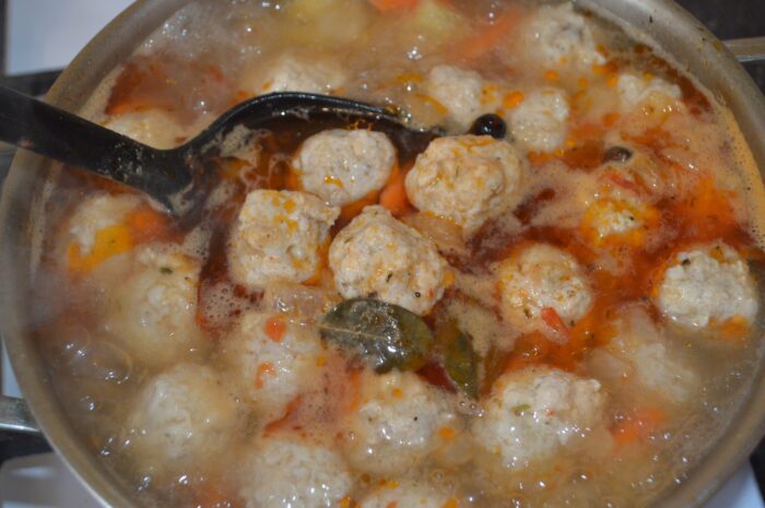 add the meatballs one by one