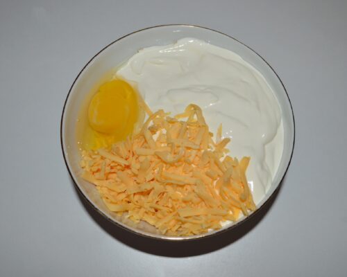 Grate the hard cheese