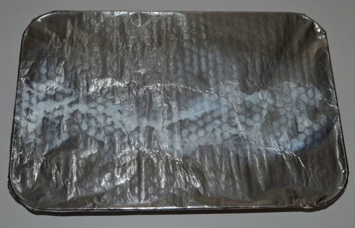 Cover the tray with aluminum foil